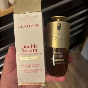 Clarins Serum Bottle in Gold and Brown